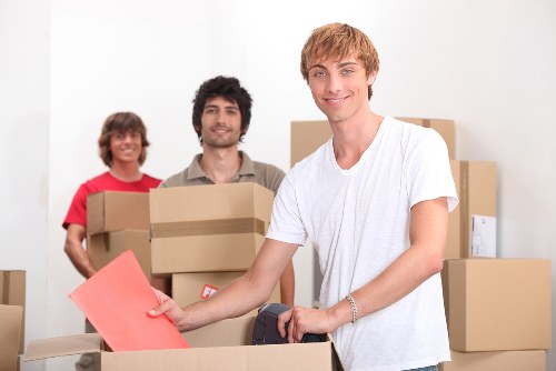 Packed boxes and furniture ready for a flat removal in Osterley
